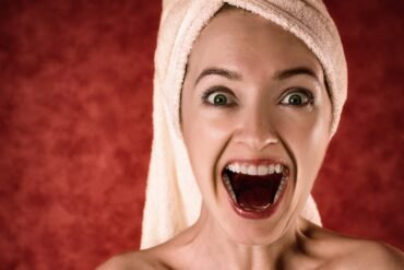 woman, towel, surprised